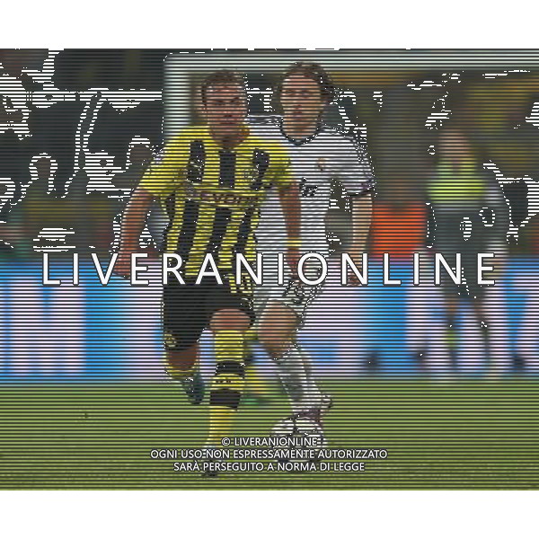 firo FuÃŸball,Fussball, 24.04.2013 Champions League Halbfinale Saison 2012/2013 BVB Borussia Dortmund - Real Madrid 4:1 Zweikampf Mario GÃ¶tze Einzelaktion gegen Modric $worldrightsEs gelten unsere AGB, einsehbar auf www.firosportphoto.de copyright by firo sportphoto: Coesfelder StraÃŸe 207 48249 DÃ¼lmen Duelmen www.firosportphoto.de mail@firosportphoto.de (V o l k s b a n k B o c h u m - W i t t e n ) BLZ.: 430 601 29 Kt. Nr.: 341 117 100 Tel:Â  0209 - 9304402 Fax:Â  0209 - 9304443 AG ALDO LIVERANI S A S ONLY ITALY