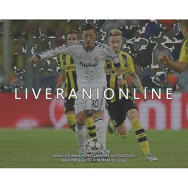 firo FuÃŸball,Fussball, 24.04.2013 Champions League Halbfinale Saison 2012/2013 BVB Borussia Dortmund - Real Madrid Zweikampf Messt Ã–zil gegen Marco Reus $worldrightsEs gelten unsere AGB, einsehbar auf www.firosportphoto.de copyright by firo sportphoto: Coesfelder StraÃŸe 207 48249 DÃ¼lmen Duelmen www.firosportphoto.de mail@firosportphoto.de (V o l k s b a n k B o c h u m - W i t t e n ) BLZ.: 430 601 29 Kt. Nr.: 341 117 100 Tel:Â  0209 - 9304402 Fax:Â  0209 - 9304443 AG ALDO LIVERANI S A S ONLY ITALY
