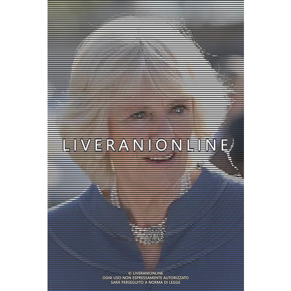 LONDON, ENGLAND - APRIL 23: Camilla, Duchess of Cornwall drinks a cup of tea in Clarence House garden as she hosts a tea party to celebrate the 5th Anniversary of the charity \'First Story\' on April 23, 2013 in London, England. First Story strives to support and inspire creativity in challenging UK secondary schools and their communities. The charity was launched in 2008 by former school teacher Katie Waldegrave. ©PHOTOSHOT/AGENZIA ALDO LIVERANI SAS - ITALY ONLY - REALI INGLESI: Camilla Duchessa di Cornovaglia, Patrono di The Big Lunch, ha presentato il grande pranzo Community Awards