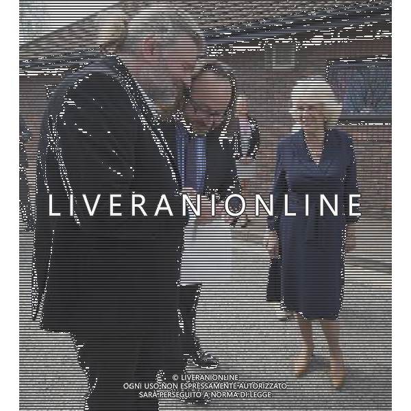 Camilla Duchess of Cornwall walks with celebrity chefs known as the ñHairy Bikersî, Simon King and David Myers, during her visit to a Community Centre run by Elmbridge Borough Council in Cobham, Surrey. She also highlighted the the importance of the Elmbridge council\'s Meals on Wheels service. The \'Hairy biker\' chefs were there as part of their campaign to revive Meals on Wheels services for pensioners. The duchess also ehighligted the work being done by Surrey County Council in their Prevention Through Partnership Programme which arranges for services, like Meals on Wheels, to be made available to enable vulnerable people to live independently but with important support in their own homes. Pic: Richard Pohle ©PHOTOSHOT/AGENZIA ALDO LIVERANI SAS - ITALY ONLY - REALI INGLESI: Camilla Duchessa di Cornovaglia