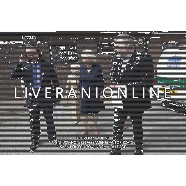 Camilla Duchess of Cornwall walks with celebrity chefs known as the ñHairy Bikersî, Simon King and David Myers, during her visit to a Community Centre run by Elmbridge Borough Council in Cobham, Surrey. She also highlighted the the importance of the Elmbridge council\'s Meals on Wheels service. The \'Hairy biker\' chefs were there as part of their campaign to revive Meals on Wheels services for pensioners. The duchess also ehighligted the work being done by Surrey County Council in their Prevention Through Partnership Programme which arranges for services, like Meals on Wheels, to be made available to enable vulnerable people to live independently but with important support in their own homes. Pic: Richard Pohle ©PHOTOSHOT/AGENZIA ALDO LIVERANI SAS - ITALY ONLY - REALI INGLESI: Camilla Duchessa di Cornovaglia