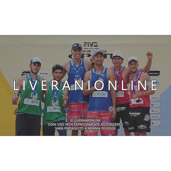 (130427) -- FUZHOU, April 27, 2013 () -- Sean Rosenthal(3rd, R) and Philip Dalhausser (3rd, L) of the United States, Nicolai Paolo (1st, L) and Daniele Lupo (2nd, L) of Italy, Alexander Huber (2nd, R)and Robin Seidl of Austria celebrate during the awarding ceremony for the men\'s event of the Fuzhou Open, the beginning of the 2013 beach volleyball season, in Fuzhou, southeast China\'s Fujian province, April 27, 2013. Sean Rosenthal and Philip Dalhausser from the United States won the final 2-0 to claim the title of the event. Nicolai Paolo/Daniele Lupo of Italy won the second place. Alexander Huber and Robin Seidl of Austria took the third place. (/Lin Shanchuan) ©Photoshot/Ag. Aldo Liverani s.a.s.-Only Italy-Editorial Use Only