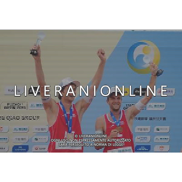 (130427) -- FUZHOU, April 27, 2013 () -- The third-place winners Alexander Huber (L) and Robin Seidl of Austria celebrate during the awarding ceremony for the men\'s event of the Fuzhou Open, the beginning of the 2013 beach volleyball season, in Fuzhou, southeast China\'s Fujian province, April 27, 2013. (/Lin Shanchuan) ©Photoshot/Ag. Aldo Liverani s.a.s.-Only Italy-Editorial Use Only