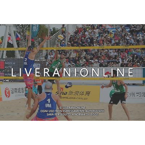 (130427) -- FUZHOU, April 27, 2013 () -- Sean Rosenthal(2nd, L)/Philip Dalhausser (1st, L) of the United States and Nicolai Paolo(1st, R)/Daniele Lupo of Italy fight for the ball during their men\'s final of the Fuzhou Open, the beginning of the 2013 beach volleyball season, in Fuzhou, southeast China\'s Fujian province, April 27, 2013. Sean Rosenthal and Philip Dalhausser from the United States won the final 2-0 to claim the title of the event. Nicolai Paolo/Daniele Lupo of Italy won the second place. (/Lin Shanchuan) ©Photoshot/Ag. Aldo Liverani s.a.s.-Only Italy-Editorial Use Only