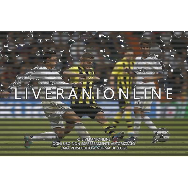 Real Madrid\'s Mesut Ozil and Borussia Dortmund\'s Blaszcykowsky during Champions League match on april 30th 2013. Photo: Cesar Cebolla / ALFAQUI AG ALDO LIVERANI S A S ONLY ITALY