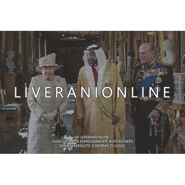 WINDSOR, ENGLAND - APRIL 30: Queen Elizabeth II (L) and Prince Philip, Duke of Edinburgh (R), greet The President of the United Arab Emirates, His Highness Sheikh Khalifa bin Zayed Al Nahyan (C), in Windsor Castle on April 30, 2013 in Windsor, England. The President of the United Arab Emirates is paying a two-day State Visit to the United Kingdom, staying in Windsor Castle as the guest of Her Majesty The Queen from April 30, 2013 to May 1, 2013. Sheikh Khalifa will meet the British Prime Minister David Cameron tomorrow at his Downing Street residence. ©photoshot/AGENZIA ALDO LIVERANI SAS - ITALY ONLY - Il presidente degli Emirati Arabi Uniti Sua Altezza lo Sceicco Khalifa bin Zayed Al Nahyan incontra la regina Elisabetta II d\'inghilterra e del Principe Filippo a Windsor, durante una visita di Stato nel Regno Unito 30 aprile 2013