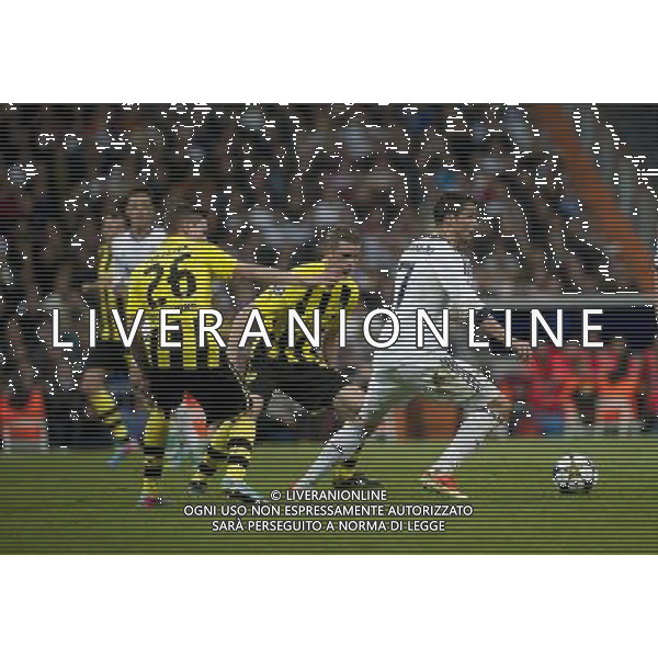 (130501) -- MADRID, May 1, 2013 () -- Real Madrid\'s Cristiano Ronaldo (1st, R) controls the ball during the UEFA Champions League semi-final second leg football match against Borussian Dortmund in Madrid, capital of Spain, April 30, 2013. Borussia Dortmund qualified for the Champions League final, beating Real Madrid 4-3 on aggregate despite a 2-0 loss Tuesday. (/Xie Haining) ©PHOTOHSOT/AGENZIA ALDO LIVERANI SAS - ONLY ITALY - REAL MADRID- BORUSSIA DORTMUND SEMIFINALE DI RITORNO DI CHAMPIONS LEAGUE