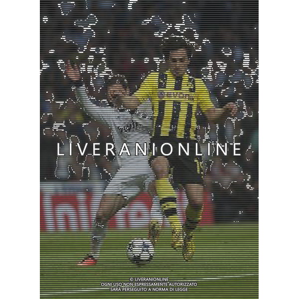 (130501) -- MADRID, May 1, 2013 () -- Borussian Dortmund\'s Mats Hummels (R) controls the ball during the UEFA Champions League semi-final against Real Madrid in Madrid, capital of Spain, April 30, 2013. Borussia Dortmund qualified for the Champions League final, beating Real Madrid 4-3 on aggregate despite a 2-0 loss Tuesday. (/Xie Haining) ©PHOTOHSOT/AGENZIA ALDO LIVERANI SAS - ONLY ITALY - REAL MADRID- BORUSSIA DORTMUND SEMIFINALE DI RITORNO DI CHAMPIONS LEAGUE