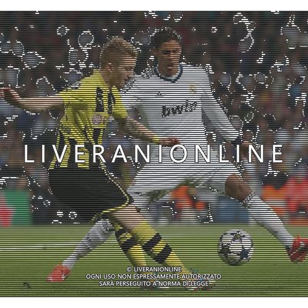 Madrid (30/04/2013).- Estadio Santiago Bernabeu. UEFA Champions League. Real Madrid - Borussia Dortmund. Marco Reus, Raphael Varane. Photo: Alex Cid-Fuentes / ALFAQUI AG ALDO LIVERANI S A S ONLY ITALY