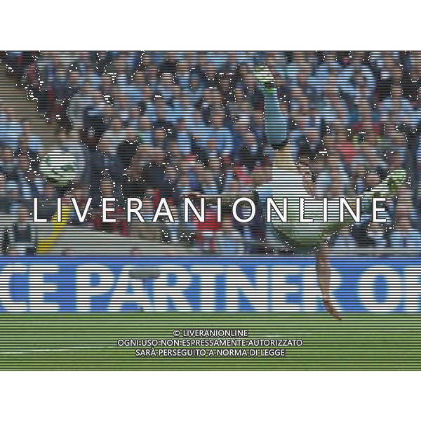 CARLOS TEVEZ MISSED OVERHEAD KICK MANCHESTER CITY V WIGAN ATHLETIC MANCHESTER CITY V WIGAN ATHLETIC. THE FA CUP FINAL 2013 WEMBLEY STADIUM, LONDON, ENGLAND, UK 11 May 2013 GAR68298 WARNING! This Photograph May Only Be Used For Newspaper And/Or Magazine Editorial Purposes. May Not Be Used For Publications Involving 1 player, 1 Club Or 1 Competition Without Written Authorisation From Football DataCo Ltd. For Any Queries, Please Contact Football DataCo Ltd on +44 (0) 207 864 9121 ©photoshot/AGENZIA ALDO LIVERANI SAS - ITALY ONLY - EDITORIAL USE ONLY