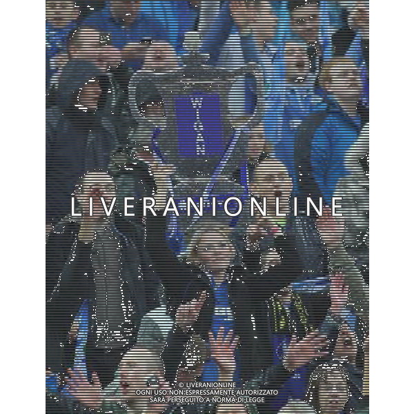 WIGAN FANS CELEBRATE WINNING THE FA CUP MANCHESTER CITY V WIGAN ATHLETIC MANCHESTER CITY V WIGAN ATHLETIC. THE FA CUP FINAL 2013 WEMBLEY STADIUM, LONDON, ENGLAND, UK 11 May 2013 GAR68294 WARNING! This Photograph May Only Be Used For Newspaper And/Or Magazine Editorial Purposes. May Not Be Used For Publications Involving 1 player, 1 Club Or 1 Competition Without Written Authorisation From Football DataCo Ltd. For Any Queries, Please Contact Football DataCo Ltd on +44 (0) 207 864 9121 ©photoshot/AGENZIA ALDO LIVERANI SAS - ITALY ONLY - EDITORIAL USE ONLY