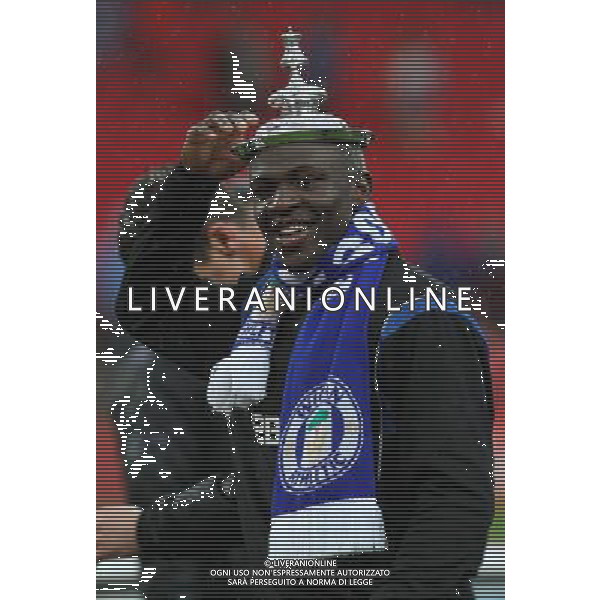 AROUNA KONE WITH THE TOP OF THE FA CUP MANCHESTER CITY V WIGAN ATHLETIC MANCHESTER CITY V WIGAN ATHLETIC. THE FA CUP FINAL 2013 WEMBLEY STADIUM, LONDON, ENGLAND, UK 11 May 2013 GAR68285 WARNING! This Photograph May Only Be Used For Newspaper And/Or Magazine Editorial Purposes. May Not Be Used For Publications Involving 1 player, 1 Club Or 1 Competition Without Written Authorisation From Football DataCo Ltd. For Any Queries, Please Contact Football DataCo Ltd on +44 (0) 207 864 9121 ©photoshot/AGENZIA ALDO LIVERANI SAS - ITALY ONLY - EDITORIAL USE ONLY