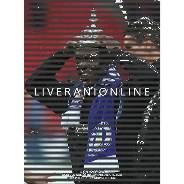 AROUNA KONE WITH THE TOP OF THE FA CUP MANCHESTER CITY V WIGAN ATHLETIC MANCHESTER CITY V WIGAN ATHLETIC. THE FA CUP FINAL 2013 WEMBLEY STADIUM, LONDON, ENGLAND, UK 11 May 2013 GAR68284 WARNING! This Photograph May Only Be Used For Newspaper And/Or Magazine Editorial Purposes. May Not Be Used For Publications Involving 1 player, 1 Club Or 1 Competition Without Written Authorisation From Football DataCo Ltd. For Any Queries, Please Contact Football DataCo Ltd on +44 (0) 207 864 9121 ©photoshot/AGENZIA ALDO LIVERANI SAS - ITALY ONLY - EDITORIAL USE ONLY