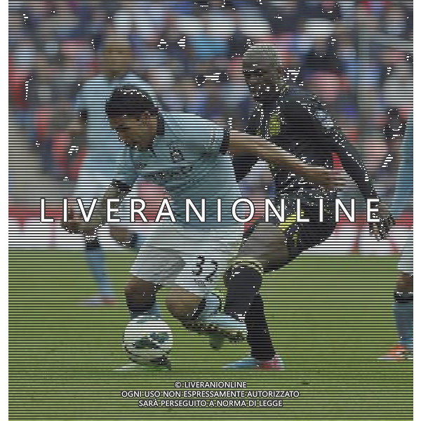 Wembley Stadium Manchester City v Wigan (0-1)FA Cup Final 11/05/2013 Carlos Tevez (Manchester City) Arouna Kone (Wigan) Photo: Roger Parker Fotosports International ©PHOTOSHOT/AGENZIA ALDO LIVERANI SAS - ITALY ONLY - EDITORIAL USE ONLY