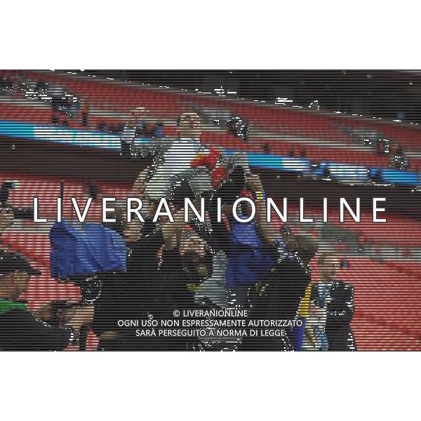 Roberto Martinez Manager Celebrates as Wigan Athlectic Players throw him in the air Wigan Athletic FA Cup Winners 2013 Manchester City V Wigan Athletic (0-1) 11/05/13 FA Cup Final Photo: Robin Parker Fotosports International ©PHOTOSHOT/AGENZIA ALDO LIVERANI SAS - ITALY ONLY - EDITORIAL USE ONLY