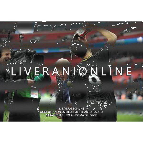 Dave Whelan Chairman has Champayne poured over his head by Franco Di Santo Wigan Athletic 2012/13 Manchester City V Wigan Athletic (0-1) 11/05/13 FA Cup Final Photo: Robin Parker Fotosports International ©PHOTOSHOT/AGENZIA ALDO LIVERANI SAS - ITALY ONLY - EDITORIAL USE ONLY