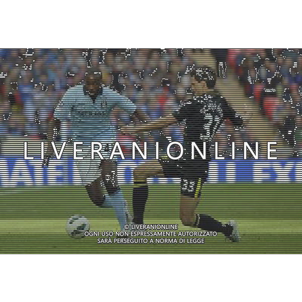 Wembley Stadium Manchester City v Wigan (0-1)FA Cup Final 11/05/2013 Yaya Toure (Manchester City) Paul Scharner (Wigan) Photo: Roger Parker Fotosports International ©PHOTOSHOT/AGENZIA ALDO LIVERANI SAS - ITALY ONLY - EDITORIAL USE ONLY