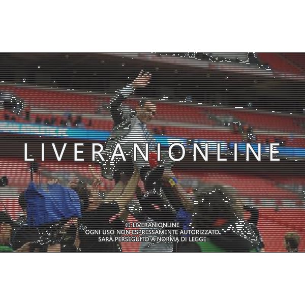 Roberto Martinez Manager Celebrates as Wigan Athlectic Players throw him in the air Wigan Athletic FA Cup Winners 2013 Manchester City V Wigan Athletic (0-1) 11/05/13 FA Cup Final Photo: Robin Parker Fotosports International ©PHOTOSHOT/AGENZIA ALDO LIVERANI SAS - ITALY ONLY - EDITORIAL USE ONLY