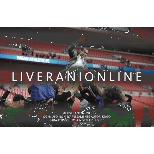 Roberto Martinez Manager Celebrates as Wigan Athlectic Players throw him in the air Wigan Athletic FA Cup Winners 2013 Manchester City V Wigan Athletic (0-1) 11/05/13 FA Cup Final Photo: Robin Parker Fotosports International ©PHOTOSHOT/AGENZIA ALDO LIVERANI SAS - ITALY ONLY - EDITORIAL USE ONLY