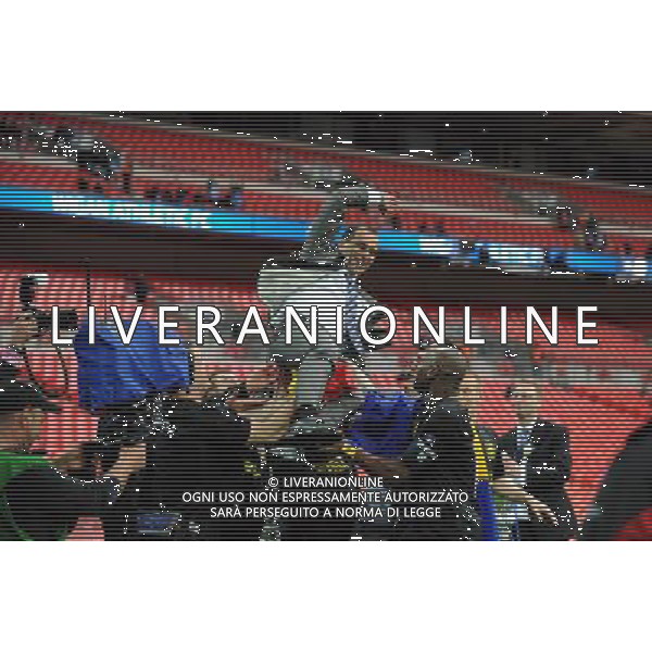 Roberto Martinez Manager Celebrates as Wigan Athlectic Players throw him in the air Wigan Athletic FA Cup Winners 2013 Manchester City V Wigan Athletic (0-1) 11/05/13 FA Cup Final Photo: Robin Parker Fotosports International ©PHOTOSHOT/AGENZIA ALDO LIVERANI SAS - ITALY ONLY - EDITORIAL USE ONLY