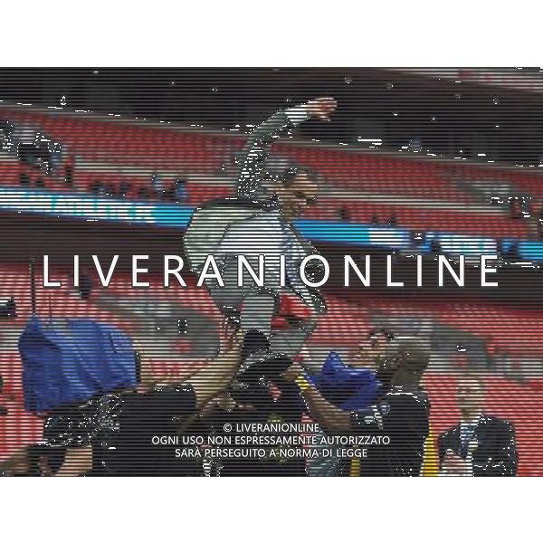 Roberto Martinez Manager Celebrates as Wigan Athlectic Players throw him in the air Wigan Athletic FA Cup Winners 2013 Manchester City V Wigan Athletic (0-1) 11/05/13 FA Cup Final Photo: Robin Parker Fotosports International ©PHOTOSHOT/AGENZIA ALDO LIVERANI SAS - ITALY ONLY - EDITORIAL USE ONLY