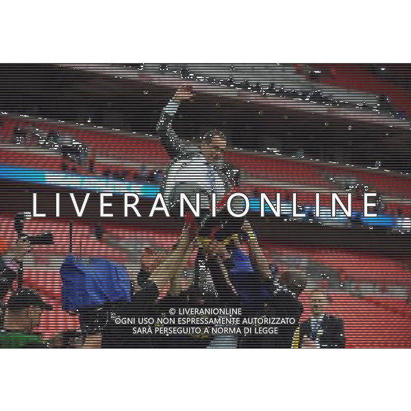 Roberto Martinez Manager Celebrates as Wigan Athlectic Players throw him in the air Wigan Athletic FA Cup Winners 2013 Manchester City V Wigan Athletic (0-1) 11/05/13 FA Cup Final Photo: Robin Parker Fotosports International ©PHOTOSHOT/AGENZIA ALDO LIVERANI SAS - ITALY ONLY - EDITORIAL USE ONLY