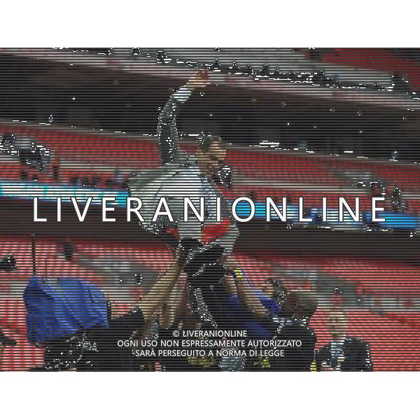 Roberto Martinez Manager Celebrates as Wigan Athlectic Players throw him in the air Wigan Athletic FA Cup Winners 2013 Manchester City V Wigan Athletic (0-1) 11/05/13 FA Cup Final Photo: Robin Parker Fotosports International ©PHOTOSHOT/AGENZIA ALDO LIVERANI SAS - ITALY ONLY - EDITORIAL USE ONLY