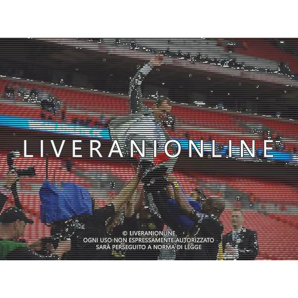 Roberto Martinez Manager Celebrates as Wigan Athlectic Players throw him in the air Wigan Athletic FA Cup Winners 2013 Manchester City V Wigan Athletic (0-1) 11/05/13 FA Cup Final Photo: Robin Parker Fotosports International ©PHOTOSHOT/AGENZIA ALDO LIVERANI SAS - ITALY ONLY - EDITORIAL USE ONLY