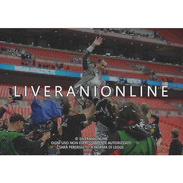 Roberto Martinez Manager Celebrates as Wigan Athlectic Players throw him in the air Wigan Athletic FA Cup Winners 2013 Manchester City V Wigan Athletic (0-1) 11/05/13 FA Cup Final Photo: Robin Parker Fotosports International ©PHOTOSHOT/AGENZIA ALDO LIVERANI SAS - ITALY ONLY - EDITORIAL USE ONLY