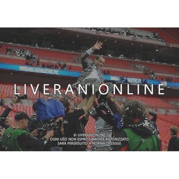 Roberto Martinez Manager Celebrates as Wigan Athlectic Players throw him in the air Wigan Athletic FA Cup Winners 2013 Manchester City V Wigan Athletic (0-1) 11/05/13 FA Cup Final Photo: Robin Parker Fotosports International ©PHOTOSHOT/AGENZIA ALDO LIVERANI SAS - ITALY ONLY - EDITORIAL USE ONLY