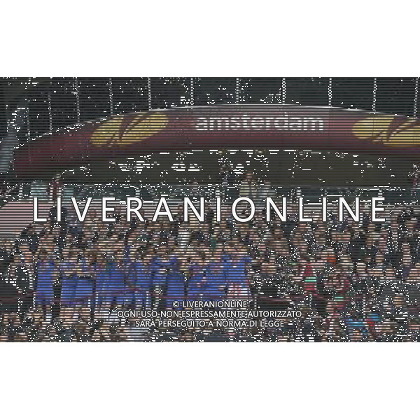 ©Marcello Pozzetti ©IPS/Marcello Pozzetti ©IPS/MAXPPP - 15/05/2013 ; Amsterdam ; UK - Che;sea lifts the Europa League cup after the final between SL Benfica vs Chelsea FC for the Europa League Final at the ArenA in Amsterdam ( Holland) on 15/05/2013. Picture by Marcello Pozzetti , ©IPS Photo Agency.Thatched Cottage - Wretham - Thetford .Norfolk IP24 1RH - .TEL 01953 499403. -Personal mobile: 07973 308 835 . *** UK OUT *** AG ALDO LIVERANI S A S ONLY ITALY