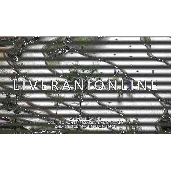 (130520) -- LOUDI, May 20, 2013 () -- Farmers work at the terraced fields at the County of Loudi City, central China\'s Hunan Province, May 19, 2013. (/Liu Aicheng) (ry) ©Photoshot/Ag. Aldo Liverani s.a.s.-Only Italy-Editorial Use Only