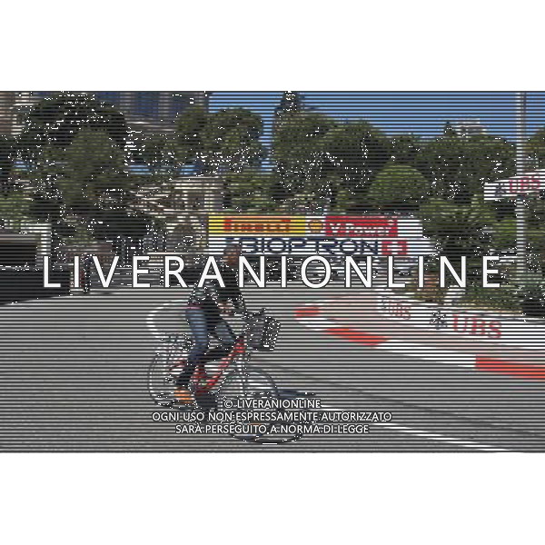 A man cycles on the circuit. 22.05.2013. Formula 1 World Championship, Rd 6, Monaco Grand Prix, Monte Carlo, Monaco, Preparation Day. - www.xpbimages.com, EMail: requests@xpbimages.com - copy of publication required for printed pictures. Every used picture is fee-liable. © Copyright: Moy / XPB Images AG ALDO LIVERANI S A S ONLY ITALY