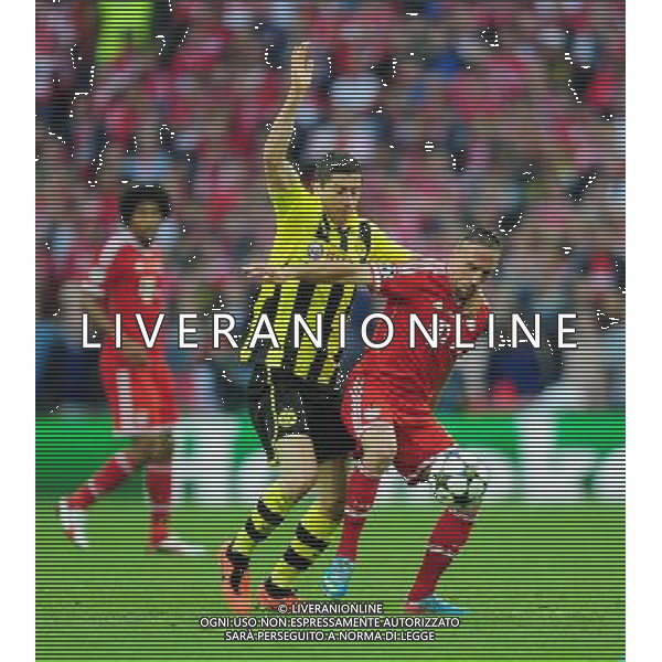 Bayern Munich\'s Franck Ribery is fouled by Borussia Dortmund\'s Robert Lewandowski (Photo by Chris Vaughan/CameraSport) Football - UEFA Champions League Final - Borussia Dortmund v Bayern Munich - Saturday 25th May 2013 - Wembley - London © CameraSport - 43 Linden Ave. Countesthorpe. Leicester. England. LE8 5PG - Tel: +44 (0) 116 277 4147 - admin@camerasport.com - www.camerasport.com AG ALDO LIVERANI S A S ONLY ITALY