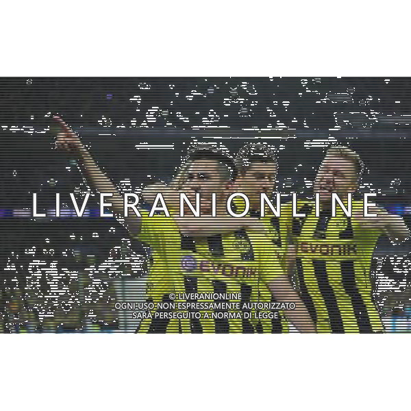 Borussia Dortmund\'s Ilkay Gundogan, left, celebrates scoring his sides equalising goal, from the penalty spot, to make the score 1-1 (Photo by Chris Vaughan/CameraSport) Football - UEFA Champions League Final - Borussia Dortmund v Bayern Munich - Saturday 25th May 2013 - Wembley - London © CameraSport - 43 Linden Ave. Countesthorpe. Leicester. England. LE8 5PG - Tel: +44 (0) 116 277 4147 - admin@camerasport.com - www.camerasport.com AG ALDO LIVERANI S A S ONLY ITALY