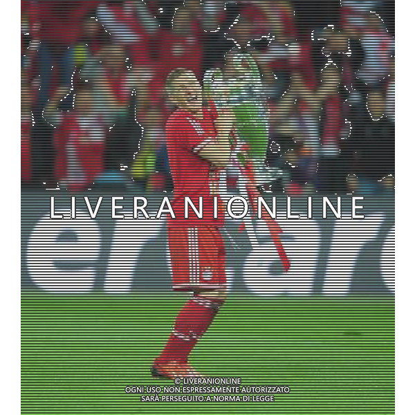 Bayern Munich\'s Bastian Schweinsteiger holds the Champions League trophy as he celebrates his team\'s win (Photo by Chris Vaughan/CameraSport) Football - UEFA Champions League Final - Borussia Dortmund v Bayern Munich - Saturday 25th May 2013 - Wembley - London © CameraSport - 43 Linden Ave. Countesthorpe. Leicester. England. LE8 5PG - Tel: +44 (0) 116 277 4147 - admin@camerasport.com - www.camerasport.com AG ALDO LIVERANI S A S ONLY ITALY