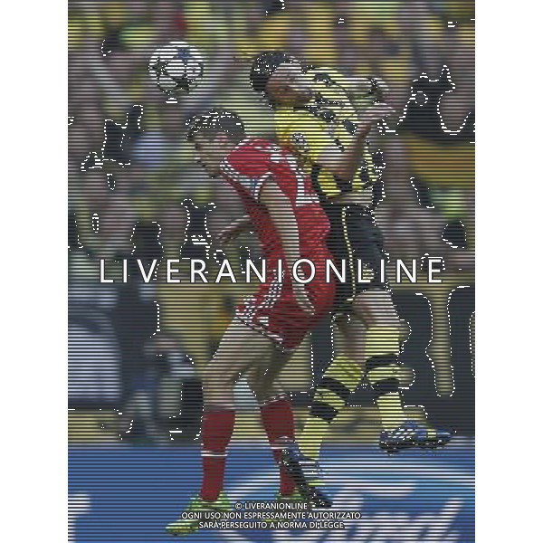 (130526) -- LONDON, May 26, 2013 () -- Thomas Muller (L) of Bayern Munich vies with Neven Subotic of Borussia Dortmund during the UEFA Champions League final football match at Wembley Stadium in London, Britain on May 25, 2013. Bayern Munich claimed the title with 2-1.(/Wang Lili) ©Photoshot/AGENZIA ALDO LIVERANI SAS-ITALY ONLY - EDITORIAL USE ONLY