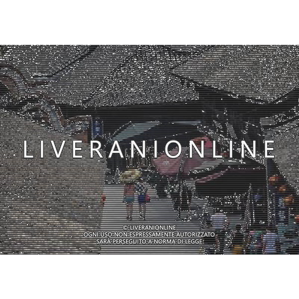 (130527) -- CHENGDU, May 27, 2013 () -- Tourists are seen on a street in Anren, an ancient town in Dayi County of Chengdu, capital of southwest China\'s Sichuan Province, May 23, 2013. Anren Town was first built in ancient China\'s Tang Dynasty (618-907). Most of its buildings were constructed in late Qing Dynasty (1644-1911) and early Republic of China (1911-1949). Chengdu will host the Global Fortune Forum, an event to be organized by the American magazine \'Fortune\', on June 6-8. (/Shen Hong) (wqq) /AGENZIA ALDO LIVERANI SAS-ITALY ONLY - EDITORIAL USE ONLY