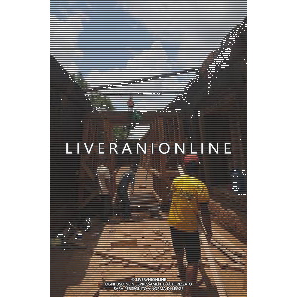 (130529) -- CHAMPASAK, May 29, 2013 () -- Labors work on the conservation and restoration project of the Vat Phou Temple Complex, in Champasak in southern Laos, May 28, 2013. The UNESCO\'s World Heritage Vat Phou and Associated Ancient Settlements within the Champasak Cultural Landscape is currently under a joint conservation and restoration project by India, Italy, France and Laos. (/Rong Zhongxia) (zw) AG ALDO LIVERANI SAS ONLY ITALY