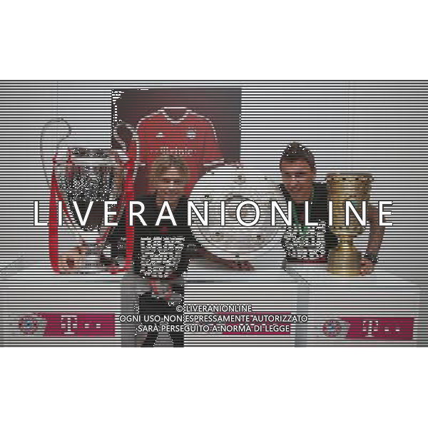 firo FuÃŸball,Fussball, 02.06.2013 DFB Pokalfeier FC Bayern MÃ¼nchen Pokalsieger Triple Sieger vor Pokalen TrophÃ¤en BERLIN, GERMANY - JUNE 01: (L-R) Anatoliy Tymoshchuk and Mario Mandzukic attend the FC Bayern Muenchen Champions party after winning the German DFB Cup final at Deutsche Telekom Represantive House Berlin on June 1, 2013 in Berlin, Germany $worldrightsEs gelten unsere AGB, einsehbar auf www.firosportphoto.de Poolfoto copyright by firo sportphoto: Coesfelder StraÃŸe 207 48249 DÃ¼lmen Duelmen www.firosportphoto.de mail@firosportphoto.de (V o l k s b a n k B o c h u m - W i t t e n ) BLZ.: 430 601 29 Kt. Nr.: 341 117 100 Tel:Â  0209 - 9304402 Fax:Â  0209 - 9304443 AG ALDO LIVERANI S A S ONLY ITALY