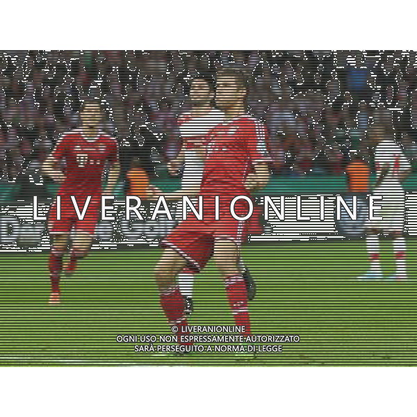 (130602) -- BERLIN, June 2, 2013 () -- Bayern Munich\'s Thomas Mueller (Front) celebrates scoring against VfB Stuttgart in the German soccer cup (DFB Pokal) final match in Berlin, Germany, June 1, 2013. Bayern Munich won 3-2 and became the first German club to wrap up a historic treble including the Bundesliga title, German Cup and UEFA Champions League. (/Luo Huanhuan) AG ALDO LIVERANI SAS ONLY ITALY