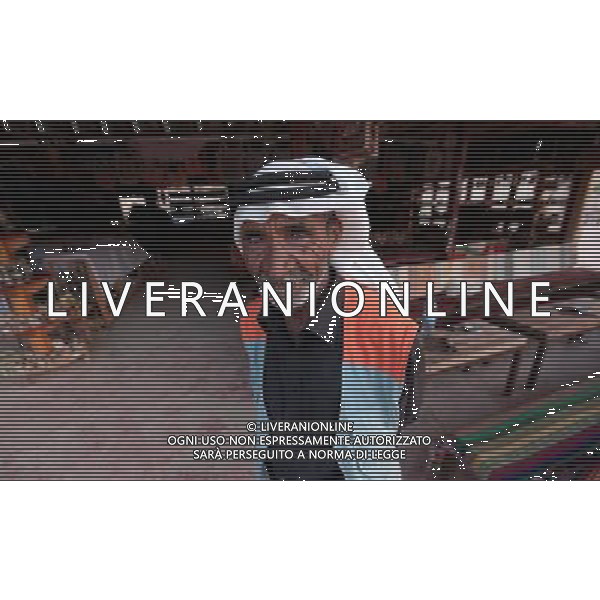 (130602) -- PETRA, June 2, 2013 () -- A local Bedouin stands in front of his little cafe in the ancient city of Petra, Jordan, on June 2, 2013. Petra is a historical and archaeological city in the southern Jordan, that is famous for its rock-cut architecture and water conduit system. (/Mohammad Abu Ghosh) (dtf) ©Photoshot/Ag. Aldo Liverani s.a.s.-Only Italy-Editorial Use Only