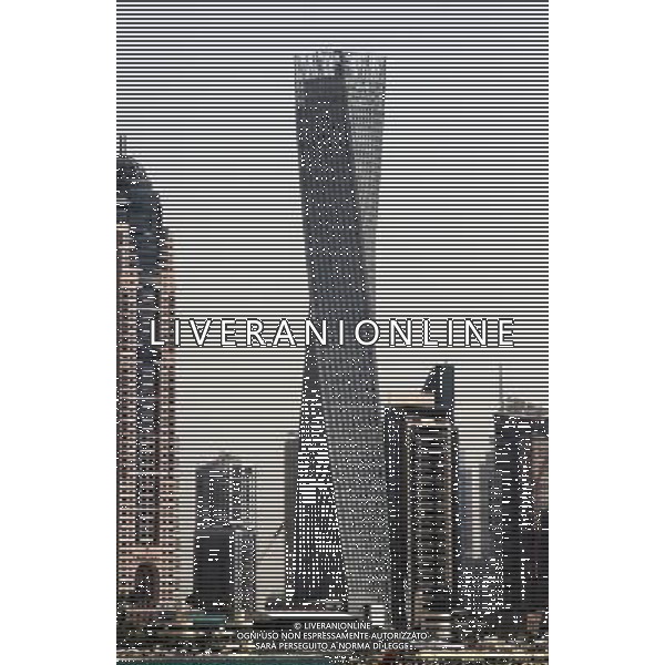 (130612) -- DUBAI, June 12, 2013 () -- Photo taken on June 10, 2013 shows the Cayan Tower in Dubai\'s prestigious Marina district, the United Arab Emirates (UAE). Saudi developer Cayan inaugurated late Monday the opening of the 73-storey, 310-meter-high Cayan Tower in Dubai\'s prestigious Marina district. (/Li Zhen) (jl) ©photohsot/AGENZIA ALDO LIVERANI SAS - ITALY ONLY - La Torre Cayan di 73 piani, con 310 metri di altezza nel prestigioso quartiere di Marina di Dubai, negli Emirati Arabi Uniti 11 giugno 2013
