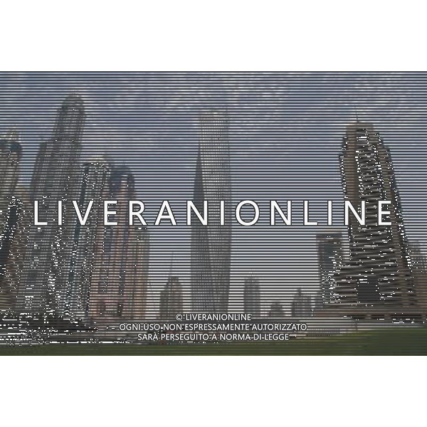 (130612) -- DUBAI, June 12, 2013 () -- Photo taken on June 11, 2013 shows the Cayan Tower in Dubai\'s prestigious Marina district, the United Arab Emirates (UAE). Saudi developer Cayan inaugurated late Monday the opening of the 73-storey, 310-meter-high Cayan Tower in Dubai\'s prestigious Marina district. (/Li Zhen) (jl) ©photohsot/AGENZIA ALDO LIVERANI SAS - ITALY ONLY - La Torre Cayan di 73 piani, con 310 metri di altezza nel prestigioso quartiere di Marina di Dubai, negli Emirati Arabi Uniti 11 giugno 2013
