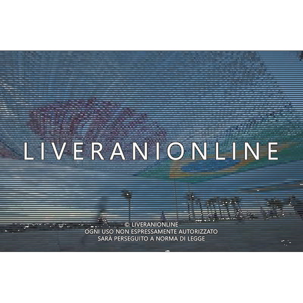 (130614) -- FORTALEZA, June 14, 2013 () -- People walk under the flags that are part of the decor of the Juninas Band Festival on Iracema Beach, in Fortaleza, state of Ceara, Brazil, on June 13, 2013. The festival is themed on this year FIFA Confederations Cup Brazil and a mosaic with the flags of all participating countries was assembled on Iracema Beach. The FIFA Confederations Cup Brazil 2013 will be held from June 15 to June 30 2013. (/AGENCIA ESTADO) (itm) (sp) ***BRAZIL OUT*** AG ALDO LIVERANI SAS ONLY ITALY