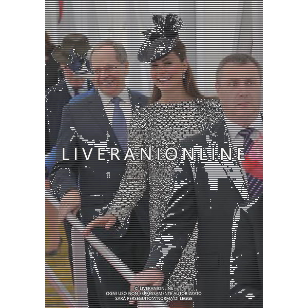 SOUTHAMPTON, ENGLAND - JUNE 13: President and CEO of Princess Cruises Alan Buckelew (L) escorts Catherine, Duchess of Cambridge as she walks down the gangplank disembarking the Royal Princess after receiveing a tour on board after the Princess Cruises ship naming ceremony at Ocean Terminal on June 13, 2013 in Southampton, England. AG ALDO LIVERANI SAS ONLY ITALY
