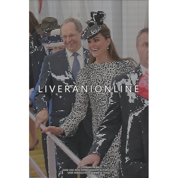 SOUTHAMPTON, ENGLAND - JUNE 13: President and CEO of Princess Cruises Alan Buckelew (L) escorts Catherine, Duchess of Cambridge as she walks down the gangplank disembarking the Royal Princess after receiveing a tour on board after the Princess Cruises ship naming ceremony at Ocean Terminal on June 13, 2013 in Southampton, England. AG ALDO LIVERANI SAS ONLY ITALY