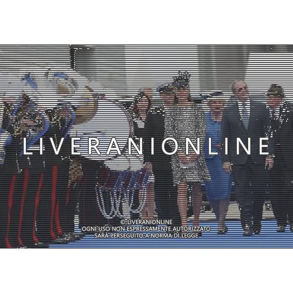 SOUTHAMPTON, ENGLAND - JUNE 13: (L-R) Captain Tony Draper, Catherine, Duchess of Cambridge and President and CEO of Princess Cruises Alan Buckelew arrive for the Princess Cruises ship naming ceremony at Ocean Terminal on June 13, 2013 in Southampton, England. AG ALDO LIVERANI SAS ONLY ITALY