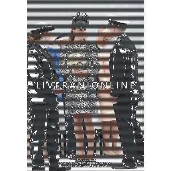 SOUTHAMPTON, ENGLAND - JUNE 13: Captain Tony Draper (R) speaks to Catherine, Duchess of Cambridge (C) during a Princess Cruises ship naming ceremony at Ocean Terminal on June 13, 2013 in Southampton, England. AG ALDO LIVERANI SAS ONLY ITALY