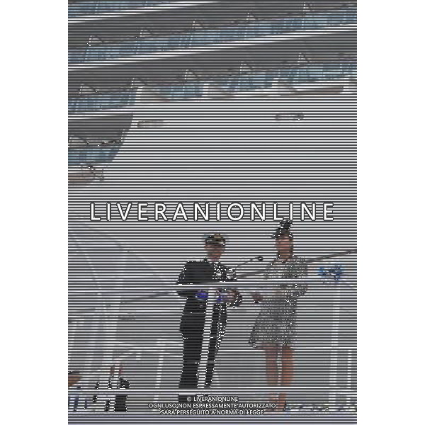 SOUTHAMPTON, ENGLAND - JUNE 13: Captain Tony Draper (L) watches as Catherine, Duchess of Cambridge speaks during the Princess Cruises ship naming ceremony at Ocean Terminal on June 13, 2013 in Southampton, England. AG ALDO LIVERANI SAS ONLY ITALY